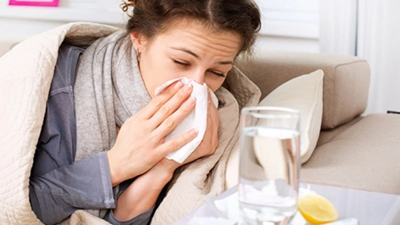 Image of a woman with a cold