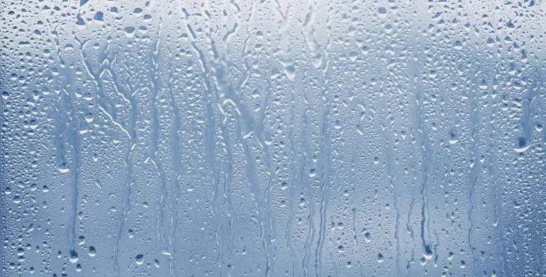 Example of condensation on a glass window due to humidity