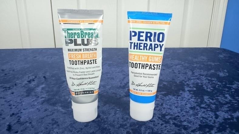 Side by side TheraBreath Fresh Breath and Healthy Gums toothpaste products